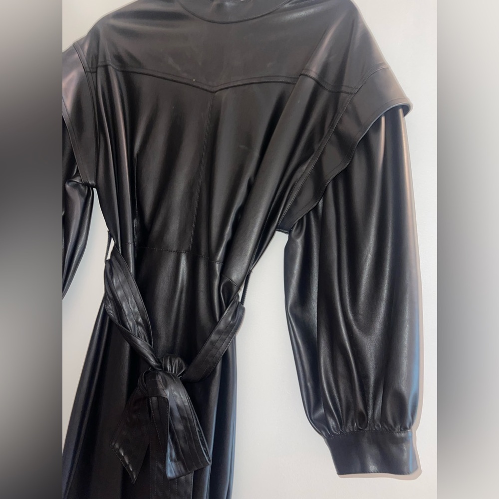 Black leather knee high dress. Size 10, worn once.